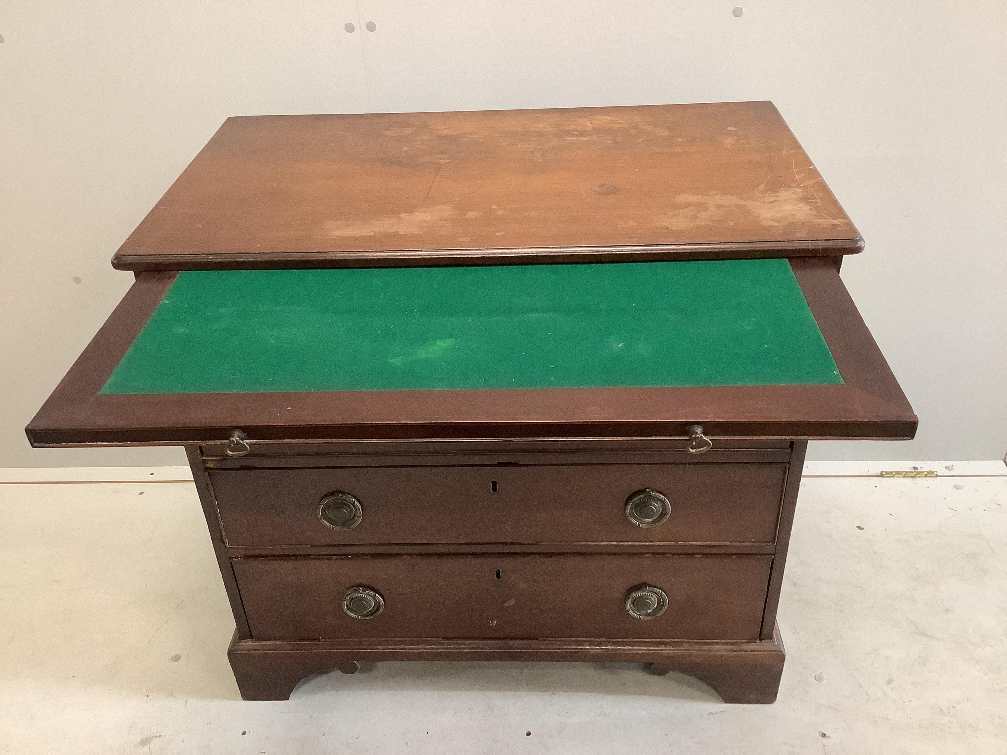 A small early 19th century four drawer mahogany chest with brushing slide, width 83cm, depth 47cm, height 78cm